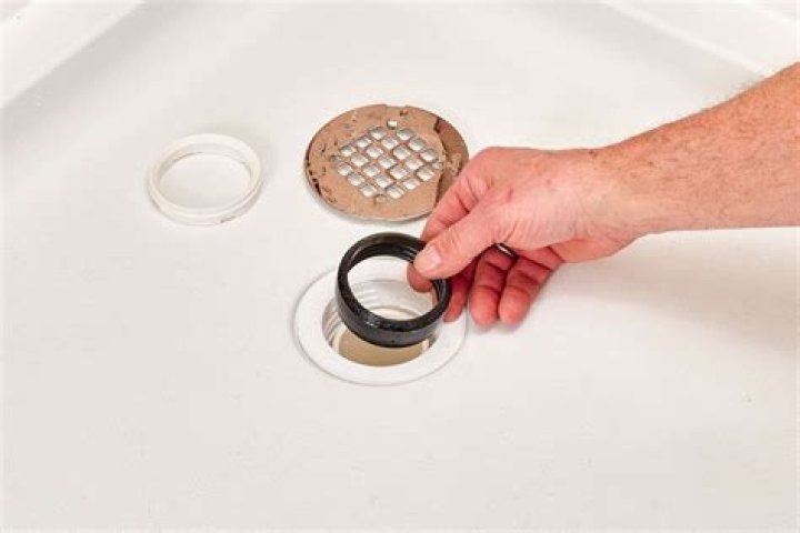 How much fall does a shower drain need?